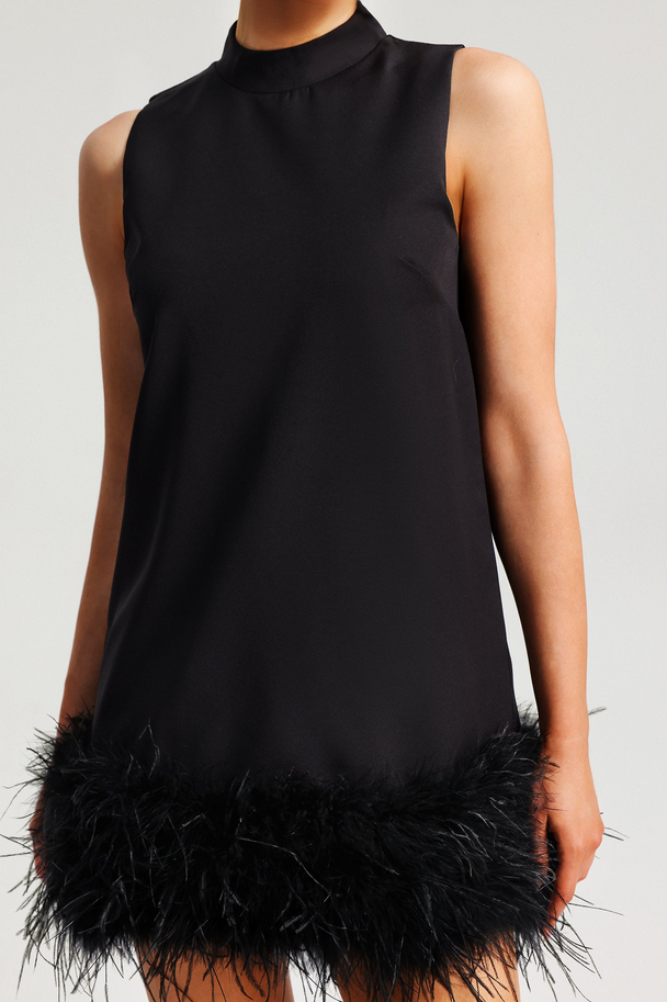 Name: Selena – Featherweight A-line dress with tassels for women 